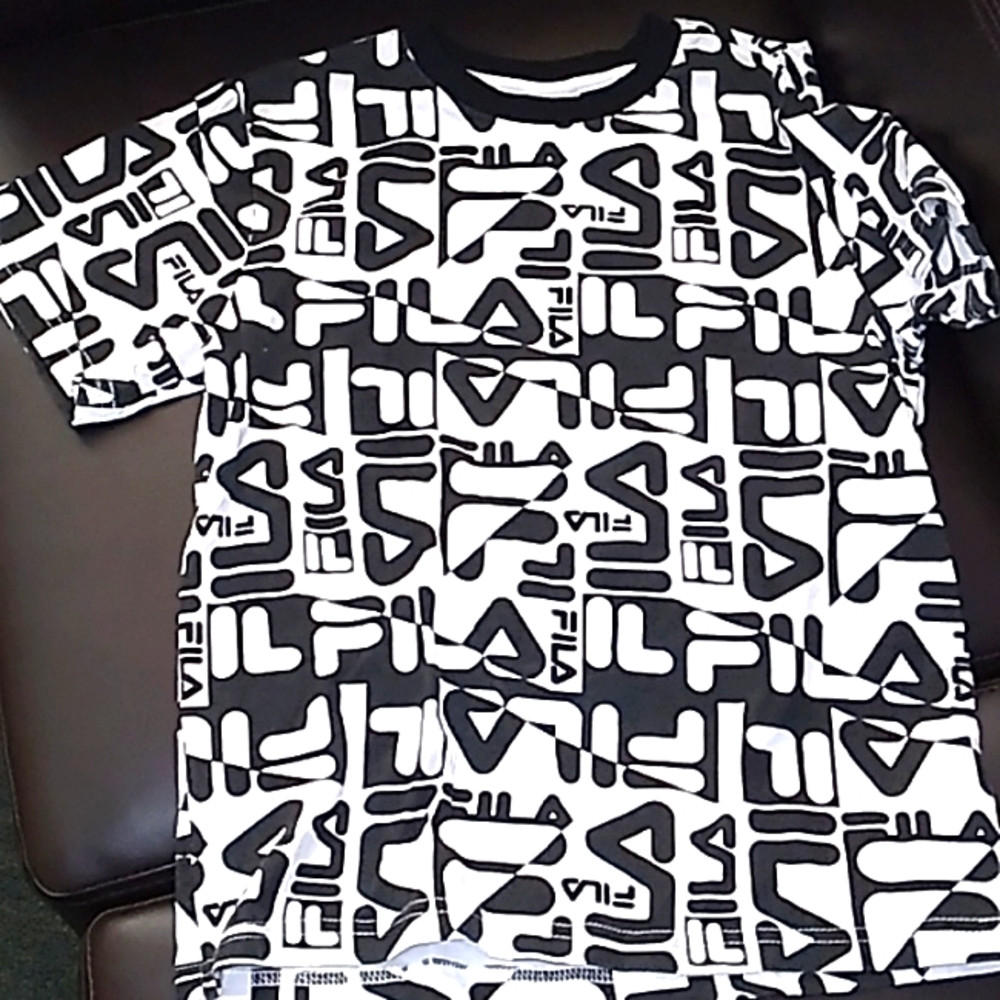 Fila, boys Tee size 12 black and white with inscription